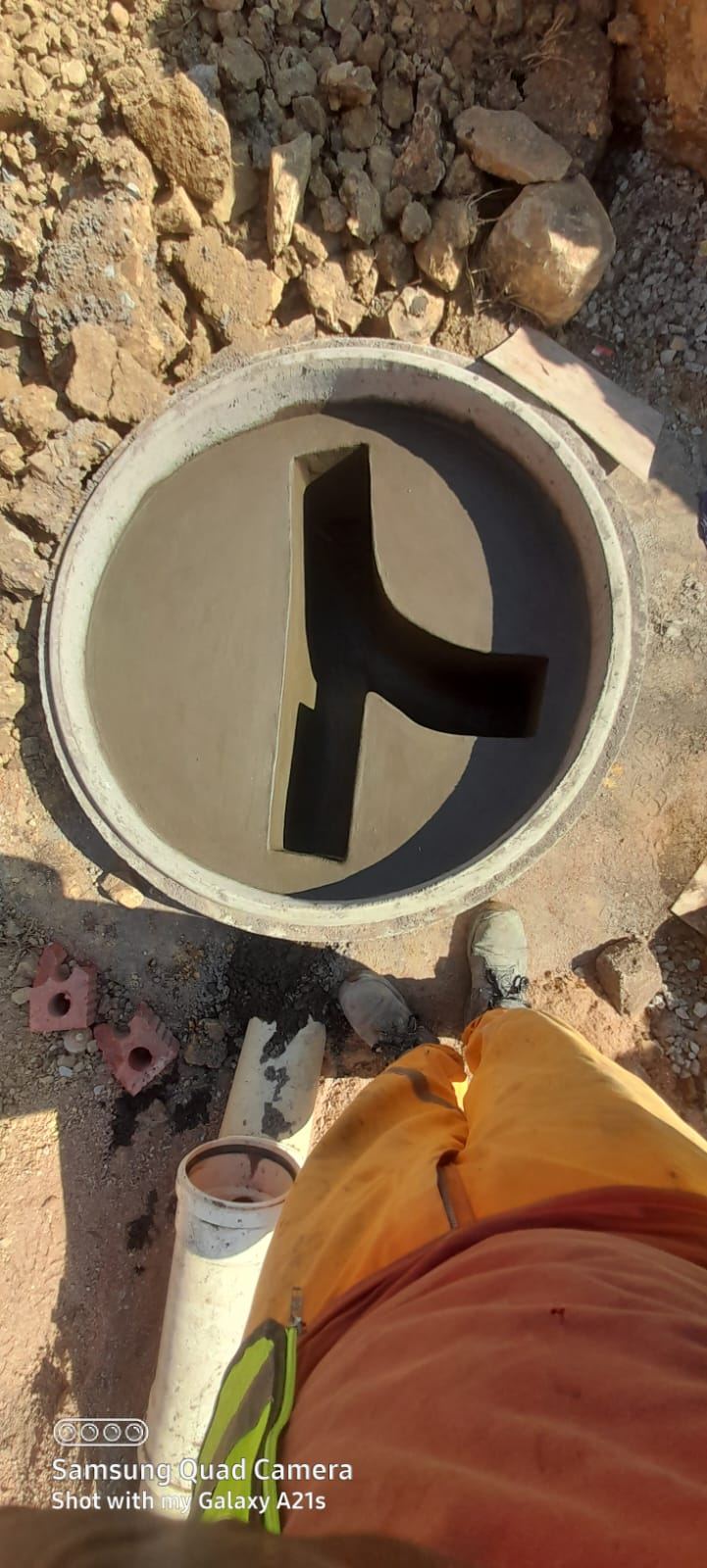 Sewer manhole being installed