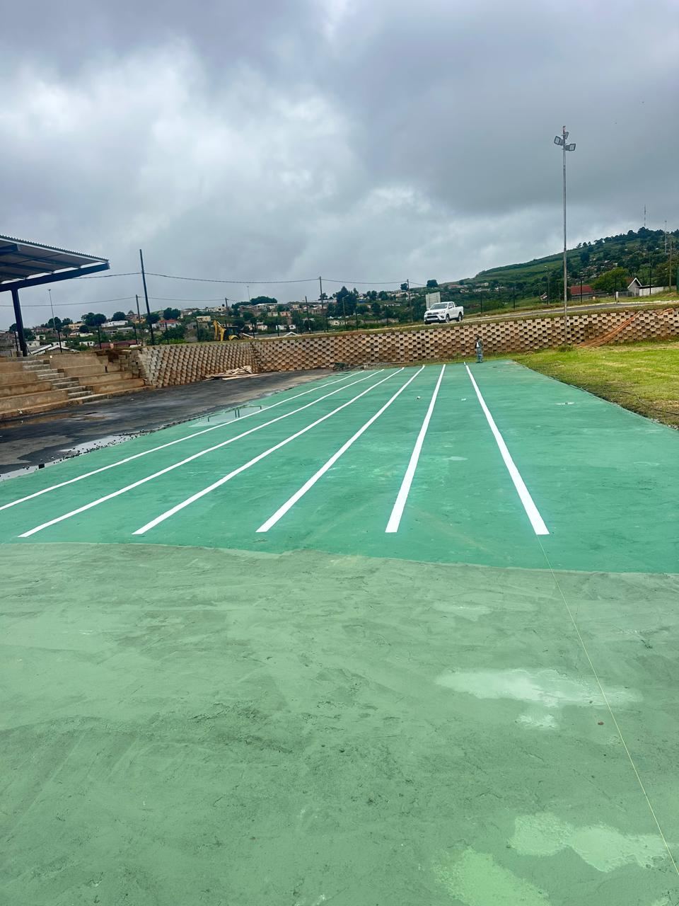 Athletics track surfacing with lane markings